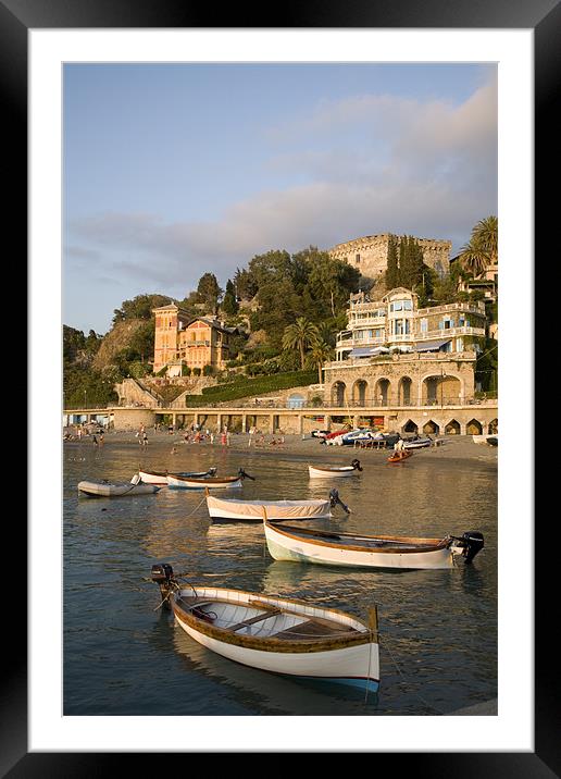 Boats moored at Levanto Beach. Framed Mounted Print by Ian Middleton