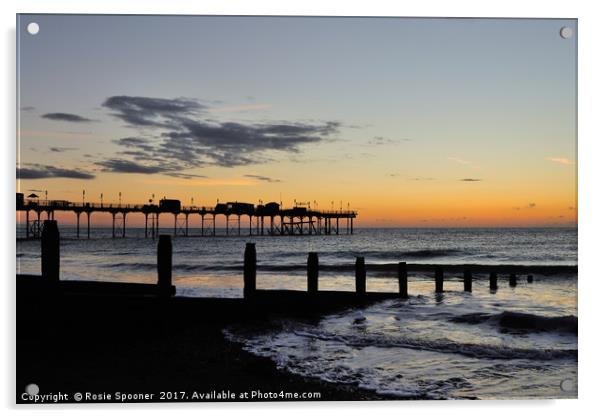 Silhouetted sunrise  of Teignmouth Pier and Groyne Acrylic by Rosie Spooner
