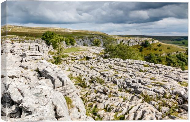 Malham Cove in the Yorkshire Dales National Park Canvas Print by Chris Warham