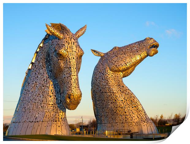 Sunrise at the Kelpies Print by Tommy Dickson