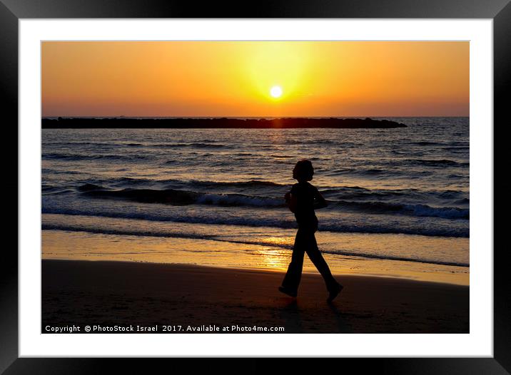 Israel, Tel Aviv, running on the beach Framed Mounted Print by PhotoStock Israel