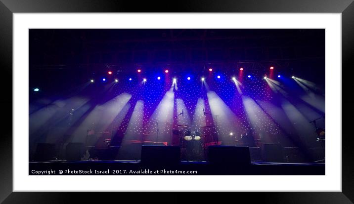 Coloured stage lights Framed Mounted Print by PhotoStock Israel