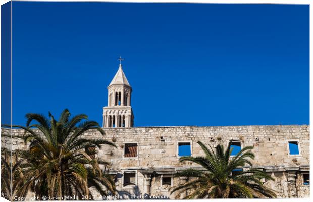 Diocletian's Palace standing above the palm trees  Canvas Print by Jason Wells