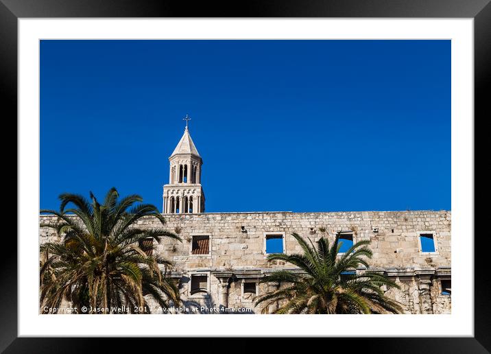 Diocletian's Palace standing above the palm trees  Framed Mounted Print by Jason Wells
