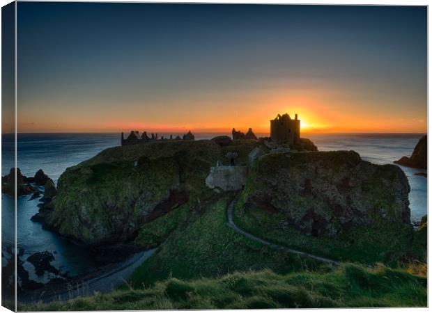 Dunnottar Castle at sunrise.                       Canvas Print by Tommy Dickson