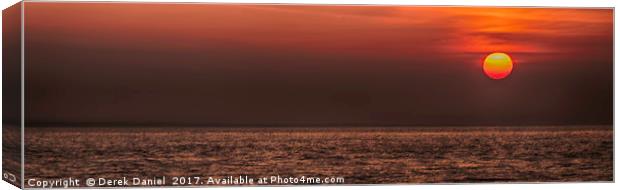 Rising sun at Peveril Point, Swanage Canvas Print by Derek Daniel