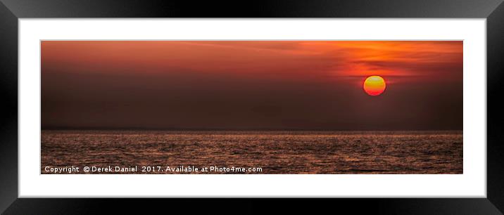 Rising sun at Peveril Point, Swanage Framed Mounted Print by Derek Daniel