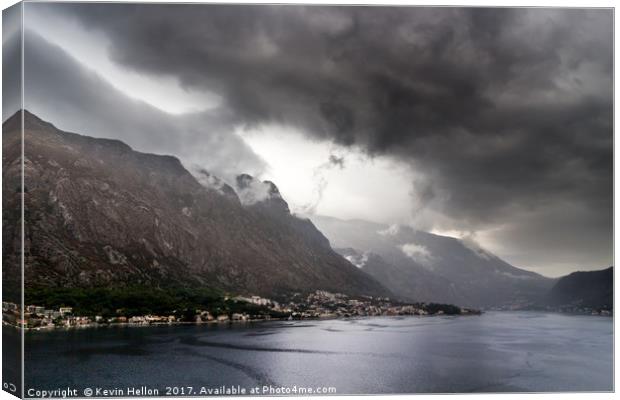 Dark stormy clouds  Canvas Print by Kevin Hellon