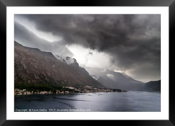Dark stormy clouds  Framed Mounted Print by Kevin Hellon