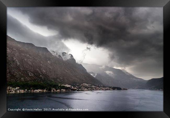 Dark stormy clouds  Framed Print by Kevin Hellon