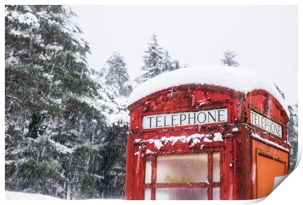 A British Red telephone box covered in snow Print by Tom Radford