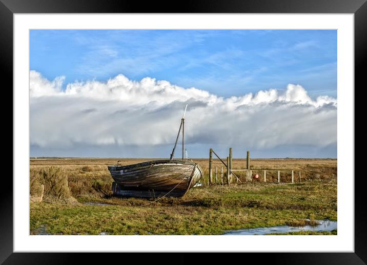 An old boat on Thornham marsh in Norfolk Framed Mounted Print by Gary Pearson