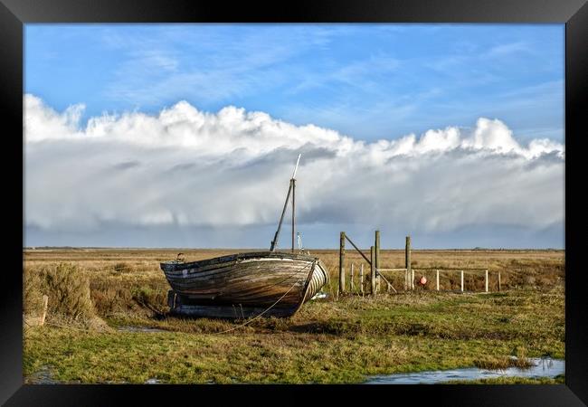An old boat on Thornham marsh in Norfolk Framed Print by Gary Pearson