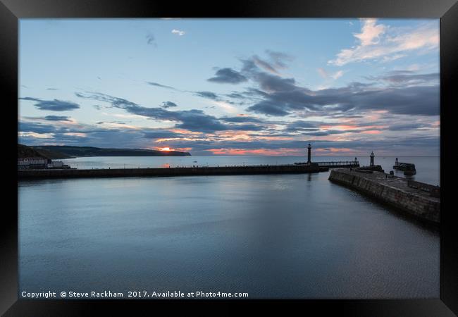 Sunset Over Whitby Harbour Entrance Framed Print by Steve Rackham