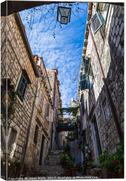 Beautiful narrow street in Dubrovnik Canvas Print by Jason Wells