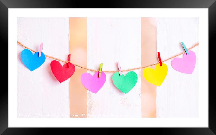 Multicolored hearts tied on a string Framed Mounted Print by Daniela Simona Temneanu