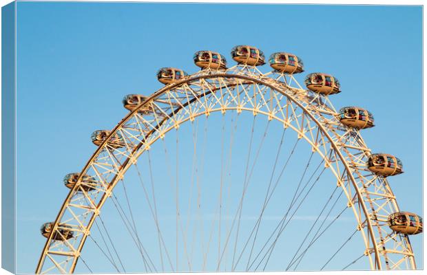 London Eye against a winter blue sky Canvas Print by Chris Warham