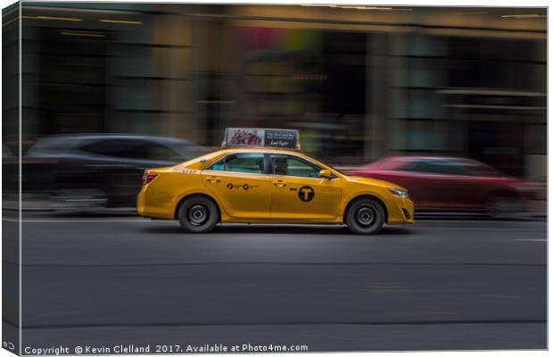 Yellow Cab Canvas Print by Kevin Clelland