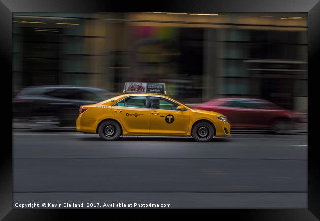 Yellow Cab Framed Print by Kevin Clelland
