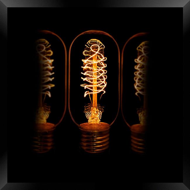 Edison bulb alight Framed Print by Donnie Canning