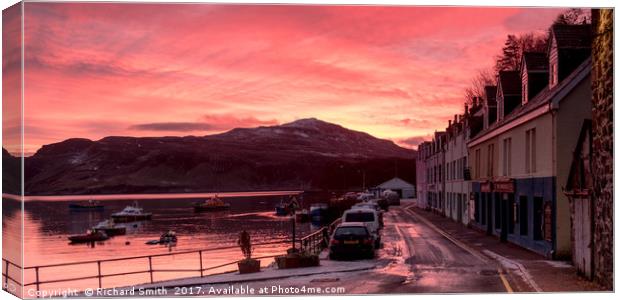 Sunrise over Ben Tianavaig and Loch Portree watche Canvas Print by Richard Smith