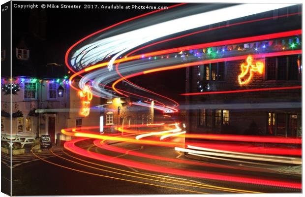 Christmas light trails Canvas Print by Mike Streeter