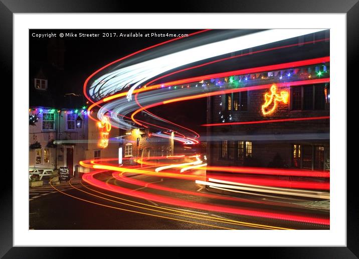 Christmas light trails Framed Mounted Print by Mike Streeter