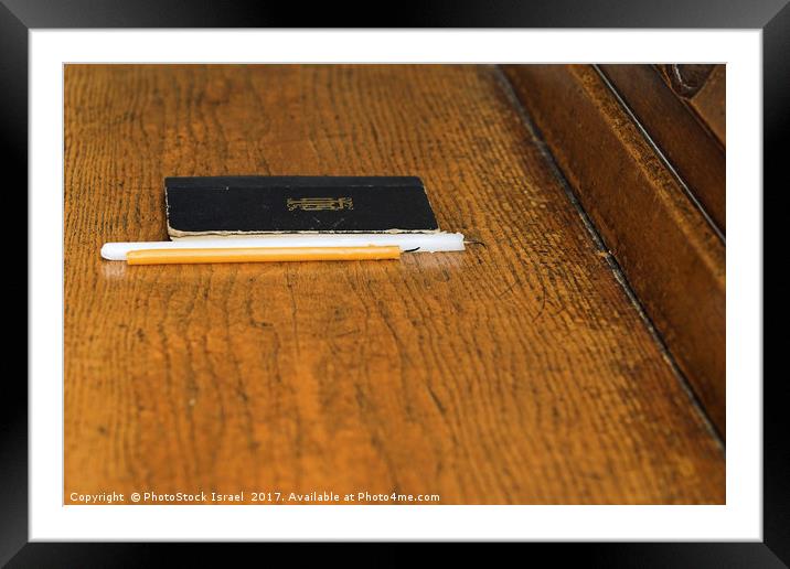 candle and prayer book Framed Mounted Print by PhotoStock Israel