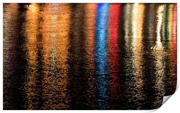 Multicoloured lights refelcted in water  Print by Chris Warham