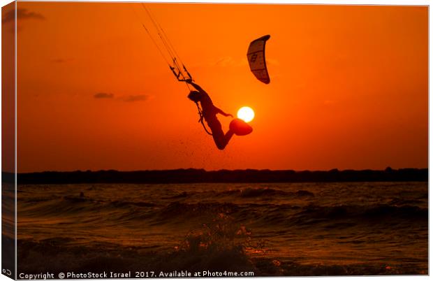 Kite surfing at sunset Canvas Print by PhotoStock Israel