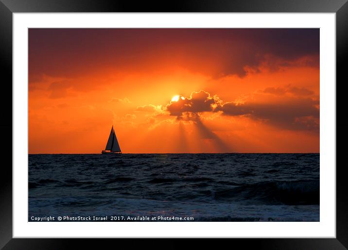 Mediterranean Sun Set and sailboat Framed Mounted Print by PhotoStock Israel