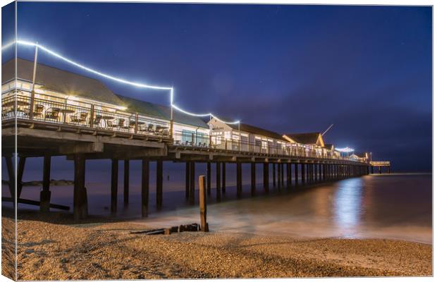 Southwold Pier after dark Canvas Print by Steve Lansdell