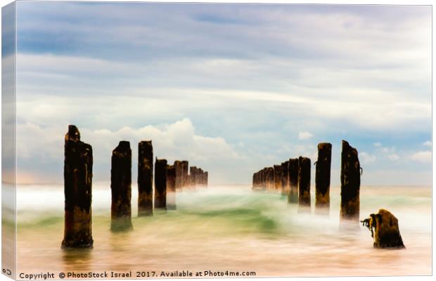 Poles in the sea, long exposure Canvas Print by PhotoStock Israel