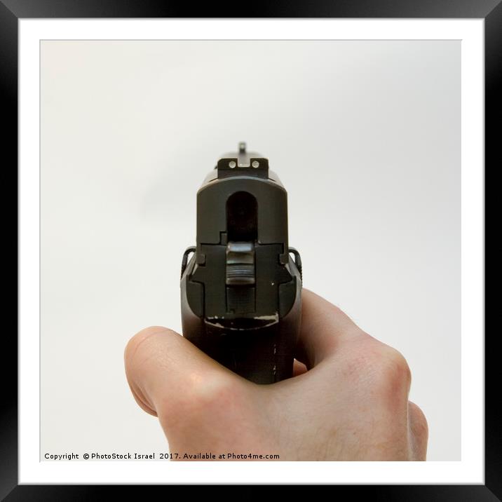 9mm hand gun Framed Mounted Print by PhotoStock Israel