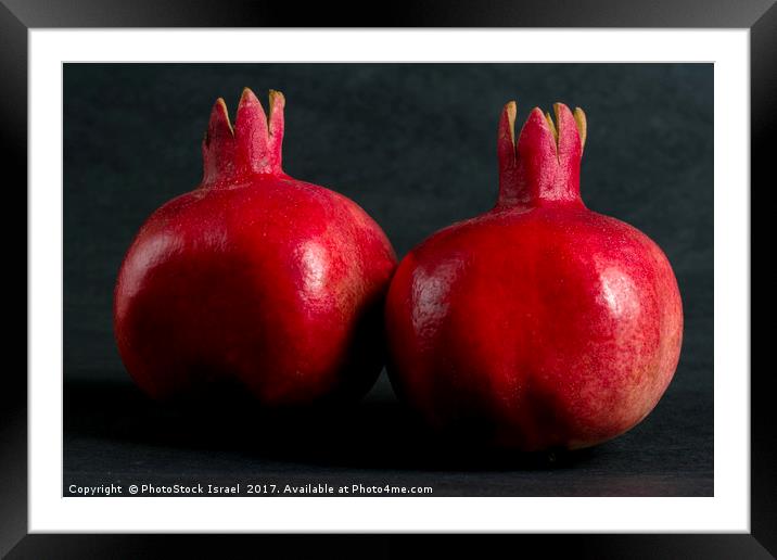 Two ripe pomegranates Framed Mounted Print by PhotoStock Israel