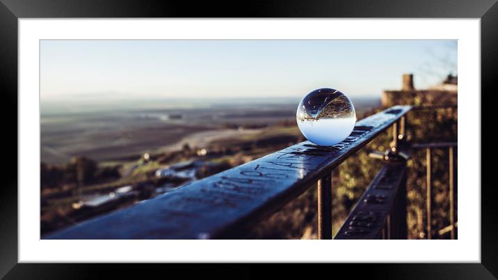 Crystal ball on railing Framed Mounted Print by Juan Ramón Ramos Rivero