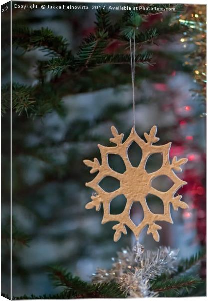 Snowflake On A Christmas Tree Canvas Print by Jukka Heinovirta