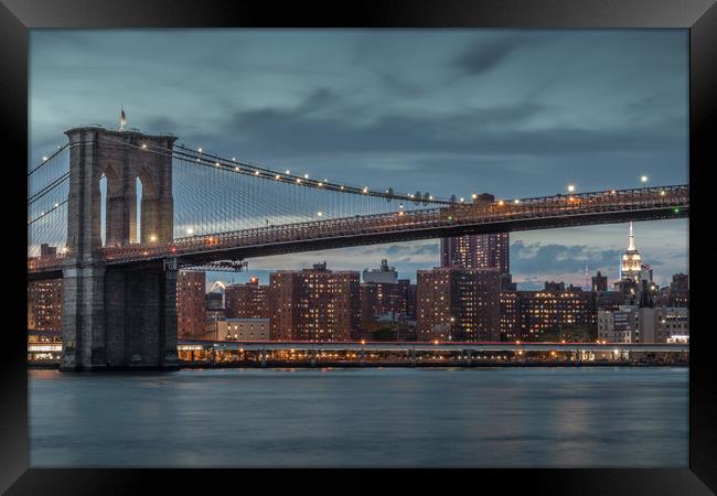 Brooklyn Bridge in New York at Sunset Framed Print by Tony Keogh