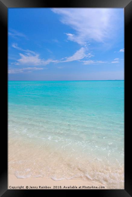 Peaceful white sandy beach with blue ocean lagoon Framed Print by Jenny Rainbow