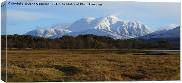 Ben Nevis with her winter coat on. Canvas Print by John Cameron