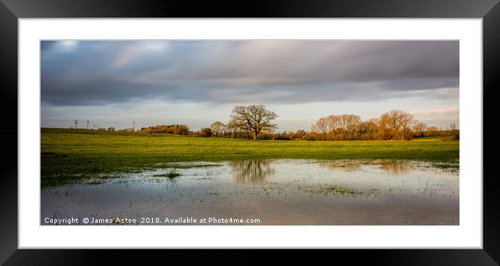 Heavy Skies on a Winters afternoon Framed Mounted Print by James Aston
