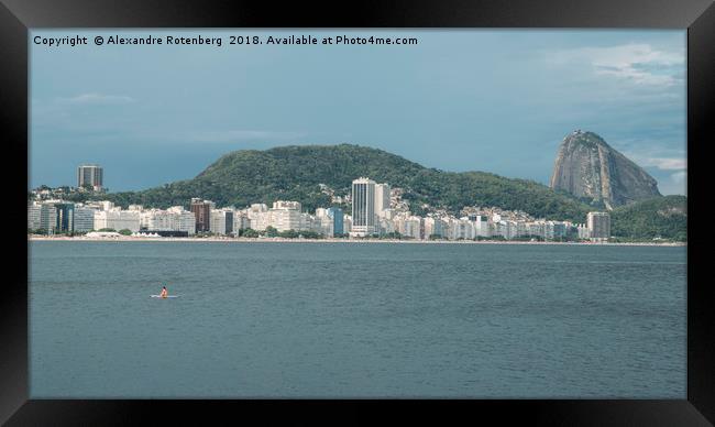 Lonely woman adrift overlooking Copacabana Beach Framed Print by Alexandre Rotenberg