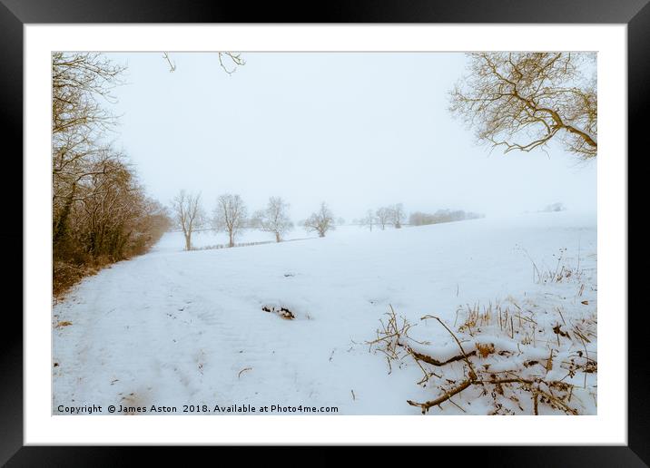 Blizzard in a Field Framed Mounted Print by James Aston