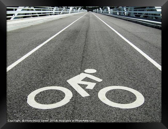 Bicycle lane Framed Print by PhotoStock Israel