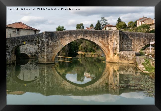 Bridge at Nerac on the River Baise Framed Print by Lynn Bolt