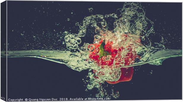 Red bell chili drops into water with splash Canvas Print by Quang Nguyen Duc
