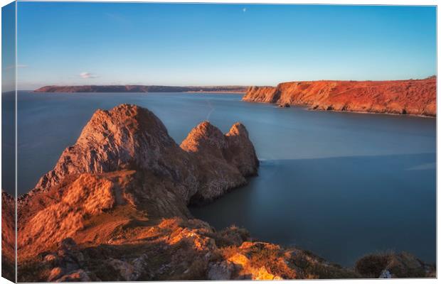 Rugged Three Cliffs Bay and the Great Tor Canvas Print by Leighton Collins