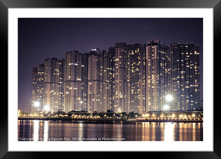 Apartment buildings block at night Framed Mounted Print by Quang Nguyen Duc