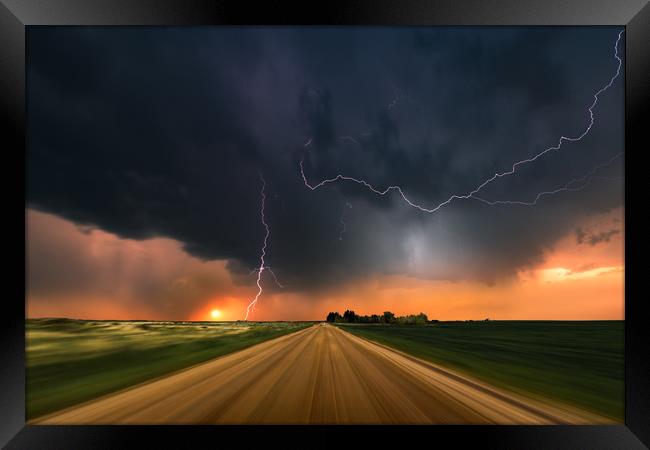 Storm Chase sunset, Colorado. Framed Print by John Finney