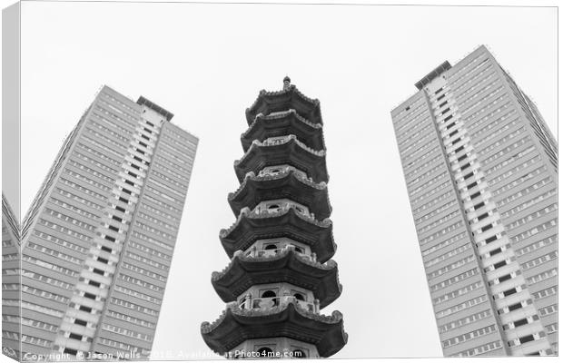 Chinese pagoda between two old blocks of flats Canvas Print by Jason Wells